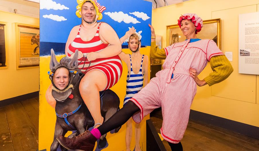 A family enjoying seaside themed dress-up fun
