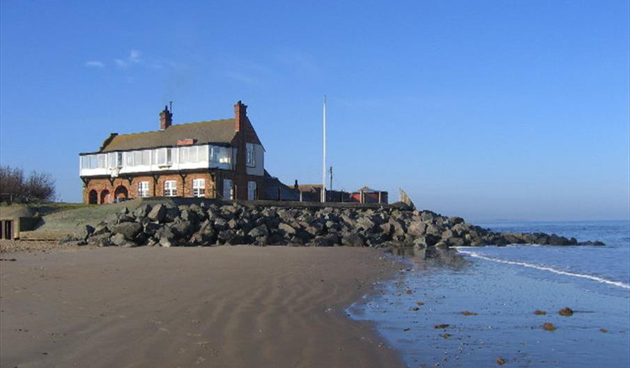 Royal West Norfolk Golf Club House at high tide