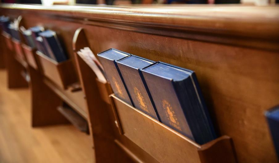 Bible at the back of bench