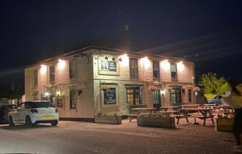 The Jolly Farmers lighting up the village