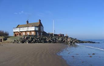 Royal West Norfolk Golf Club House at high tide