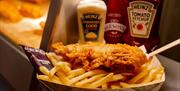 Fish and Chips being served at the Galley Fish Bar & Restaurant at Richardson's Family Entertainment Centre