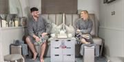 A couple enjoy treatments at Aphrodite Beauty Studio